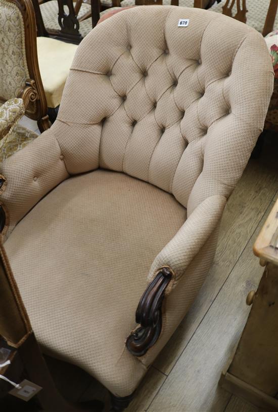 A button back scrolled arm chair